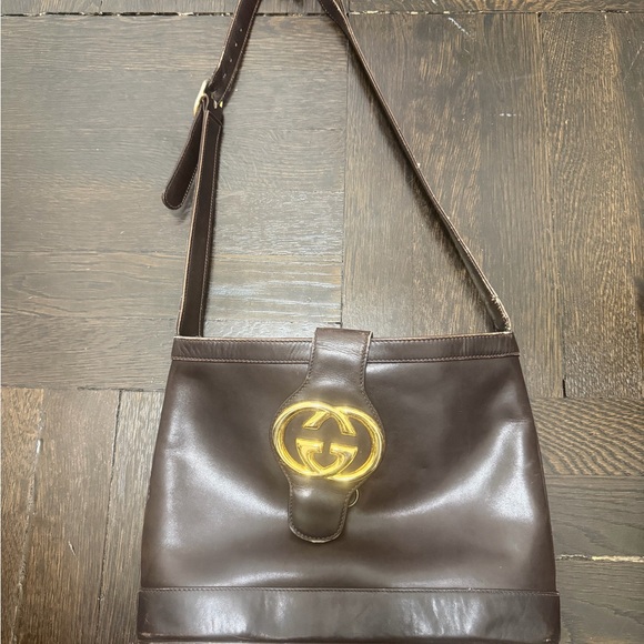 Gucci Handbags - Gucci Dark Brown Leather Bag with Gold Emblem
